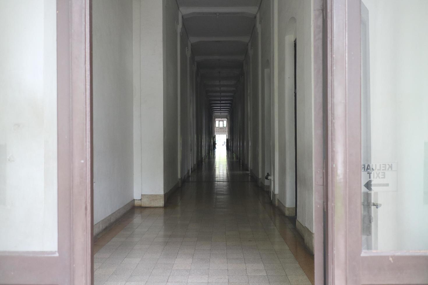 Editorial image of the long hallway in historic building lawang sewu in semarang city central java Indonesia photo