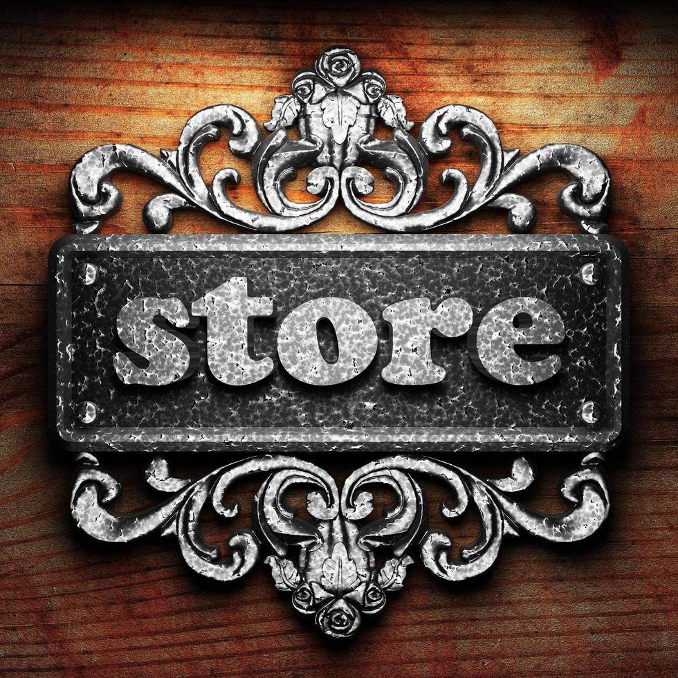 store word of iron on wooden background photo