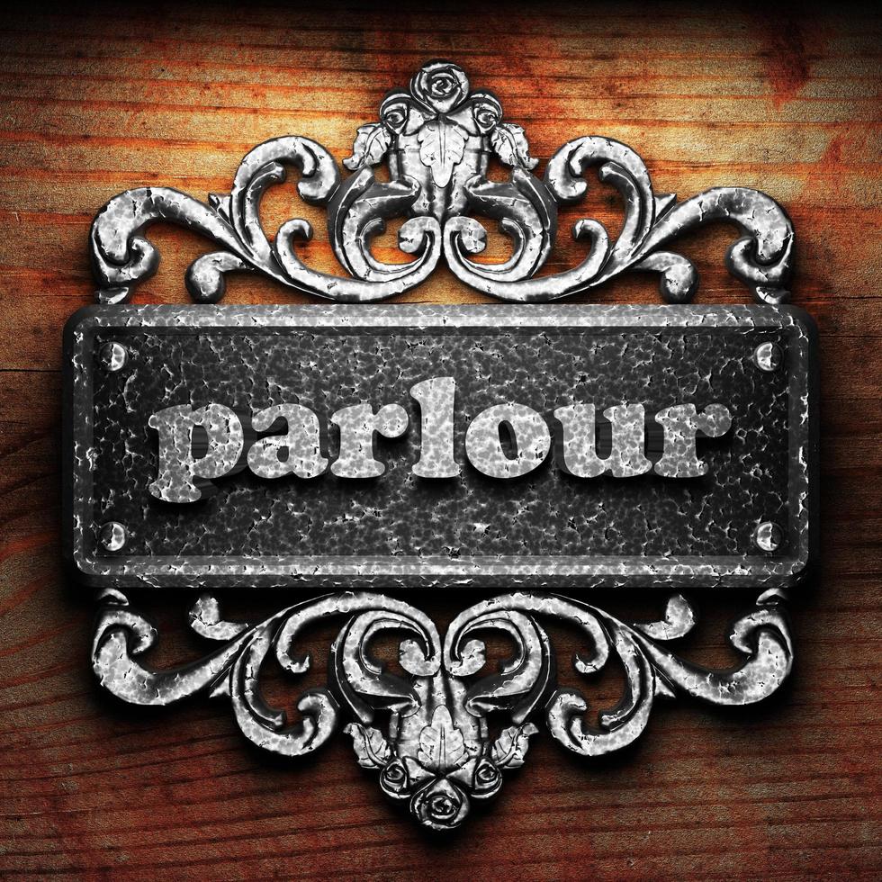 parlour word of iron on wooden background photo