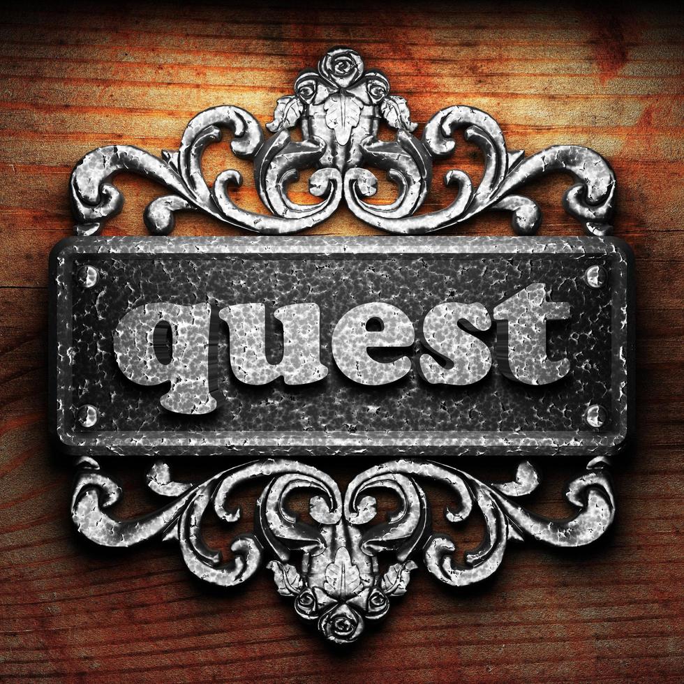 quest word of iron on wooden background photo