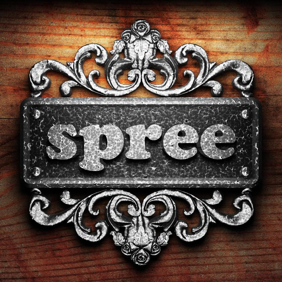 spree word of iron on wooden background photo