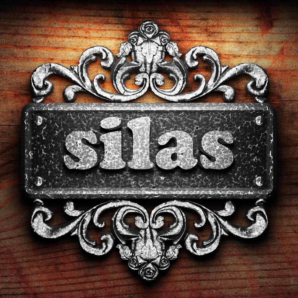 silas word of iron on wooden background photo