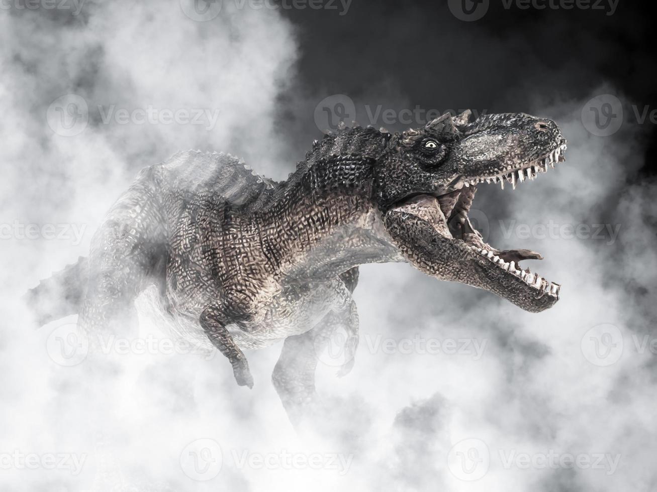 dinosaurio gorgosaurus sobre fondo de humo foto