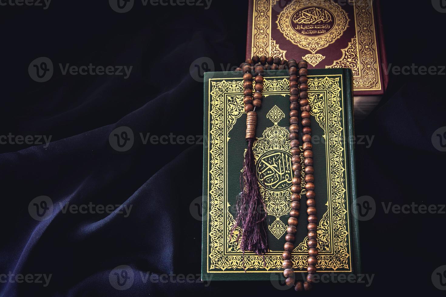 Koran  holy book of Muslims public item of all muslims  on the table , still life . photo