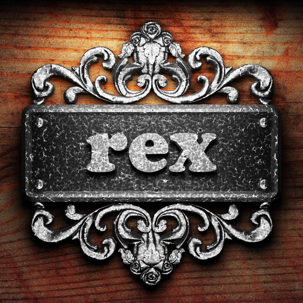 rex word of iron on wooden background photo