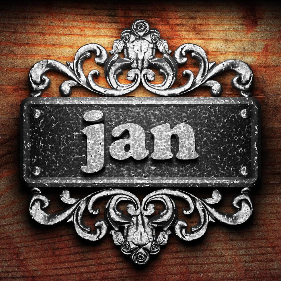 jan word of iron on wooden background photo