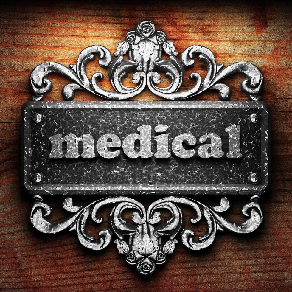 medical word of iron on wooden background photo