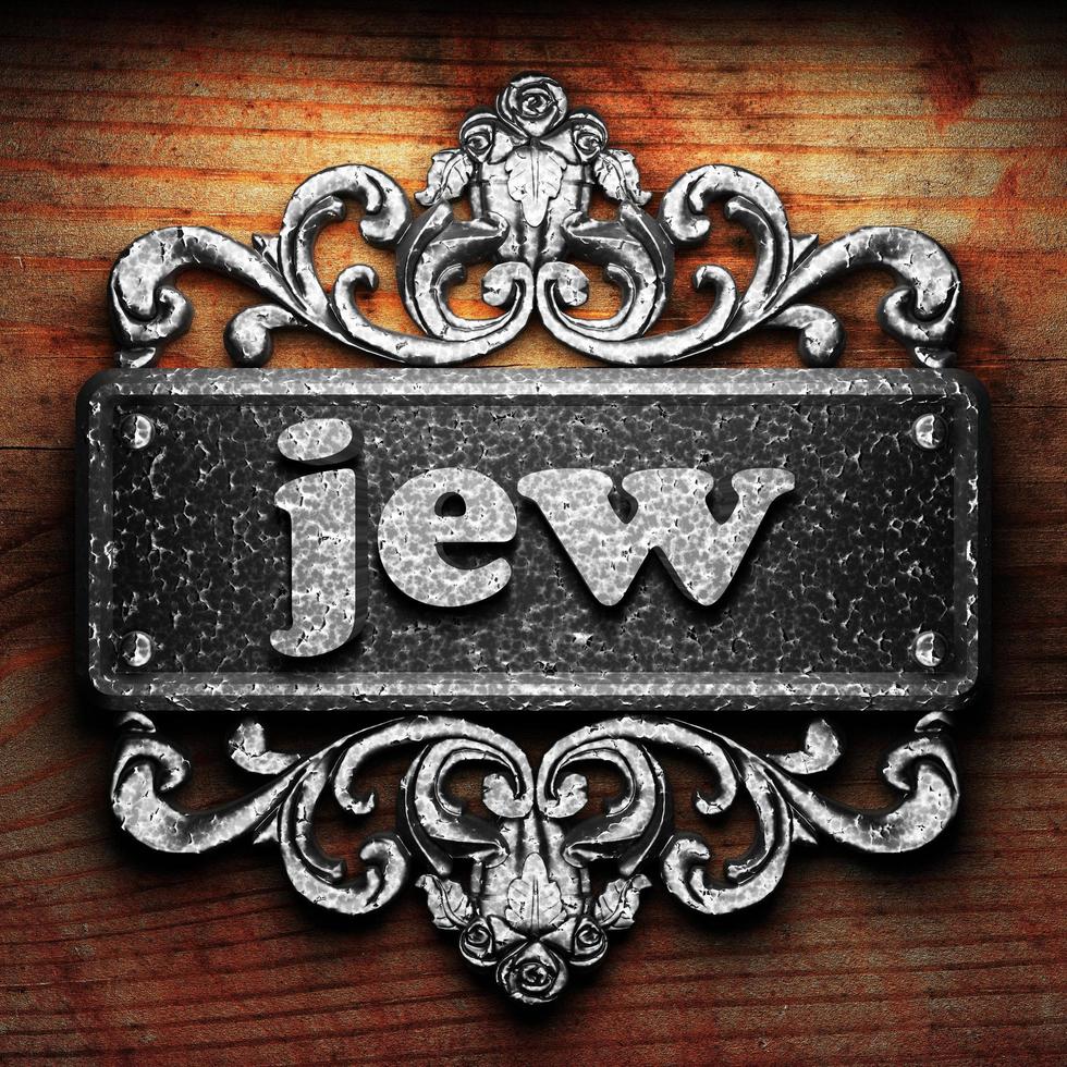 jew word of iron on wooden background photo