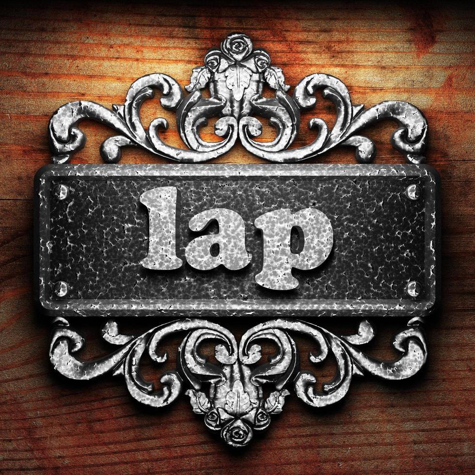 lap word of iron on wooden background photo