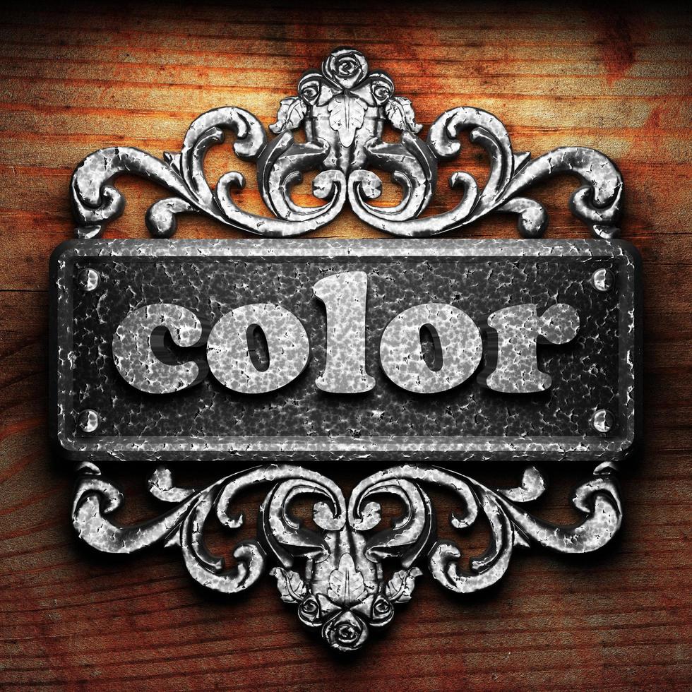 color word of iron on wooden background photo