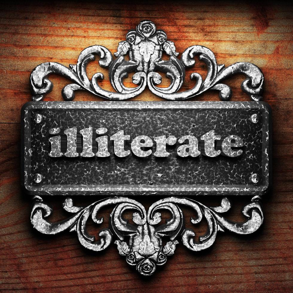 illiterate word of iron on wooden background photo