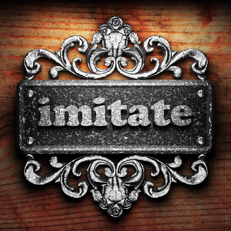 imitate word of iron on wooden background photo