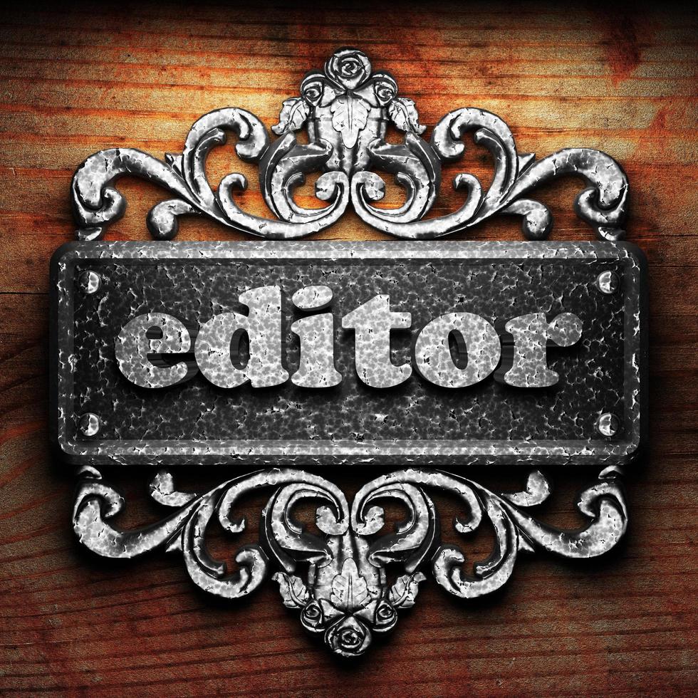 editor word of iron on wooden background photo