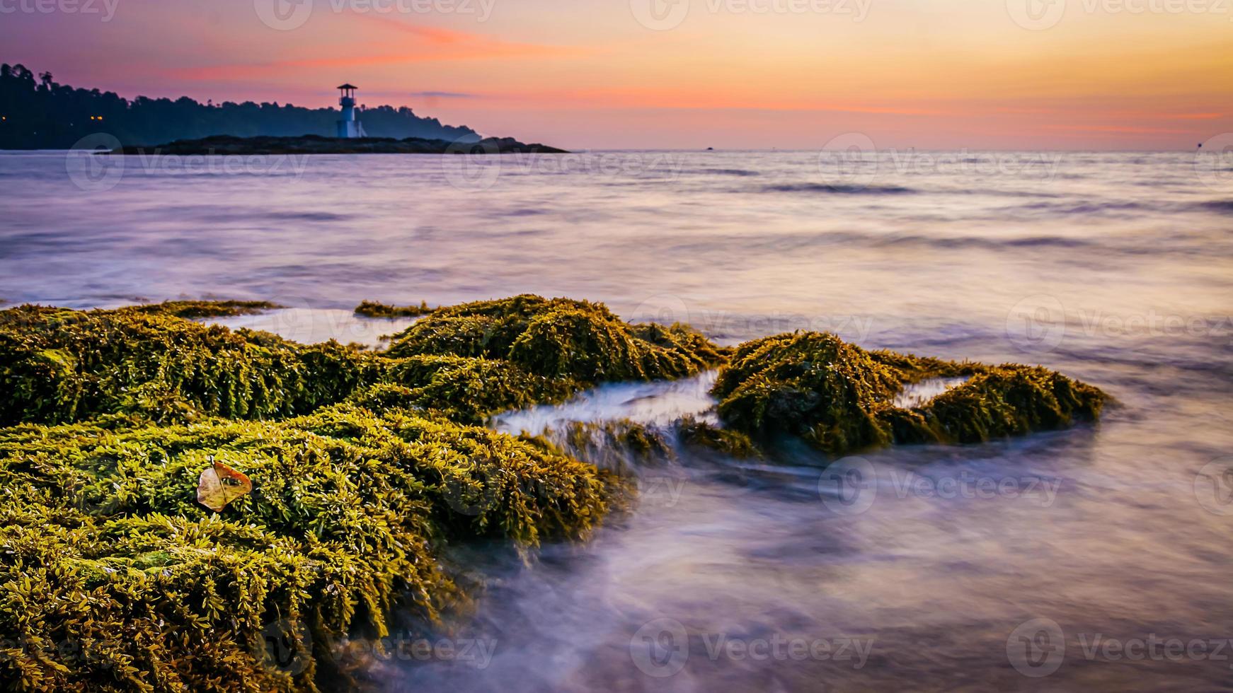 Khao Lak Light Beacon, beautiful sunset time at Nang Thong Beach , Khao Lak, Thailand. Tropical colorful sunset with cloudy sky . Patterns Texture of sand on the beach, Andaman sea Phang nga Thailand photo