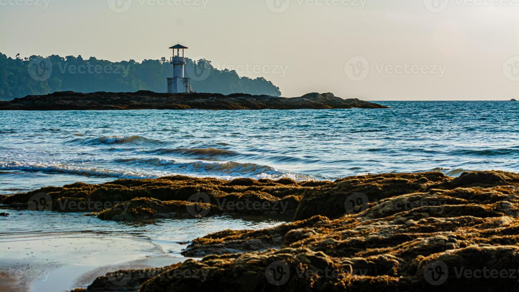 Khao Lak Light Beacon, beautiful sunset time at Nang Thong Beach , Khao Lak, Thailand. Tropical colorful sunset with cloudy sky . Patterns Texture of sand on the beach, Andaman sea Phang nga Thailand photo