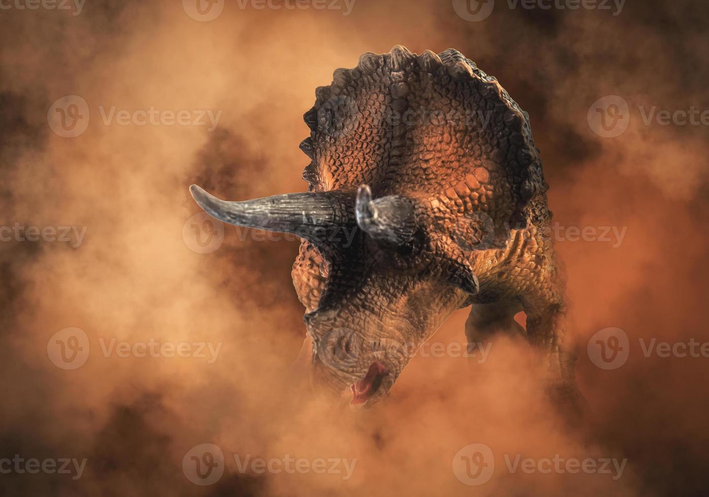 Triceratops ,dinosaur on smoke background photo