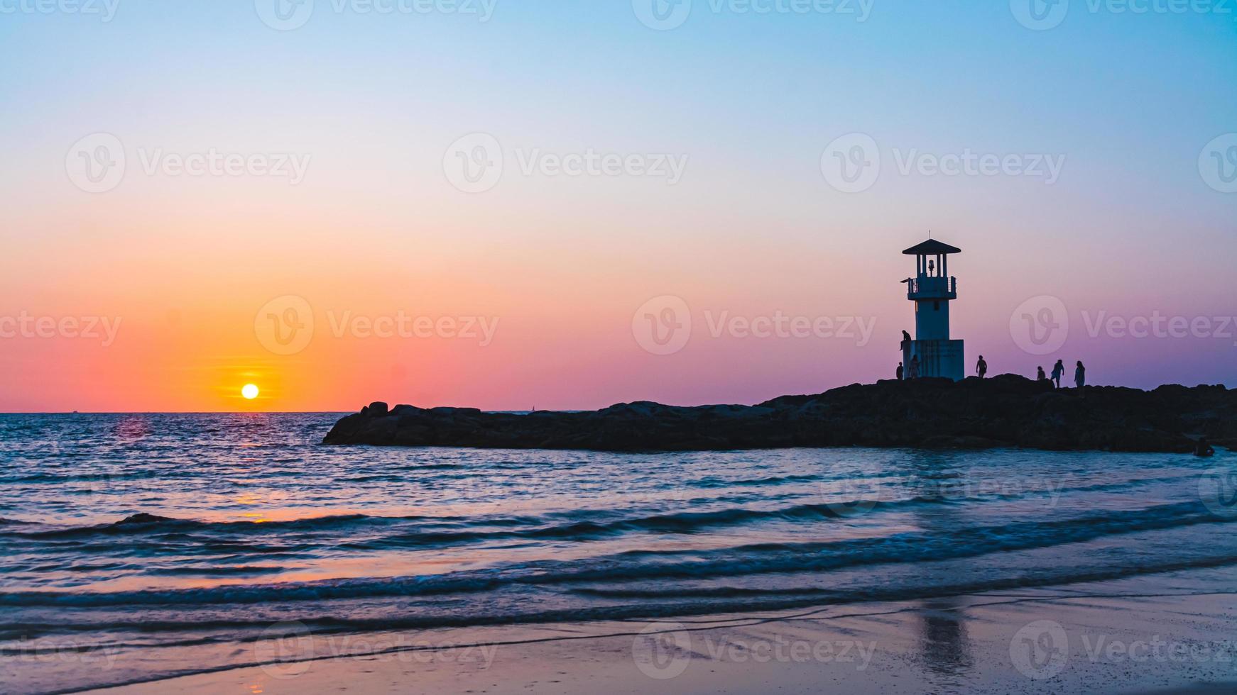 Khao Lak Light Beacon, beautiful sunset time at Nang Thong Beach , Khao Lak, Thailand. Tropical colorful sunset with cloudy sky . Patterns Texture of sand on the beach, Andaman sea Phang nga Thailand photo