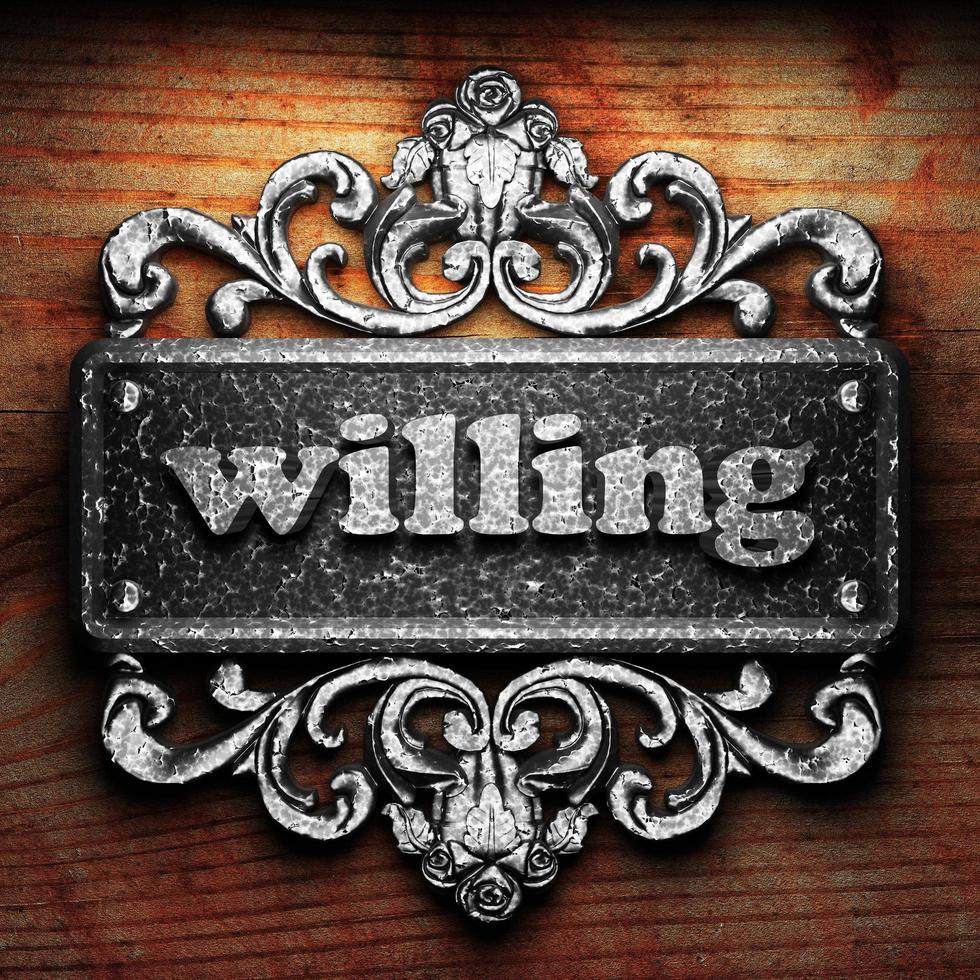 willing word of iron on wooden background photo