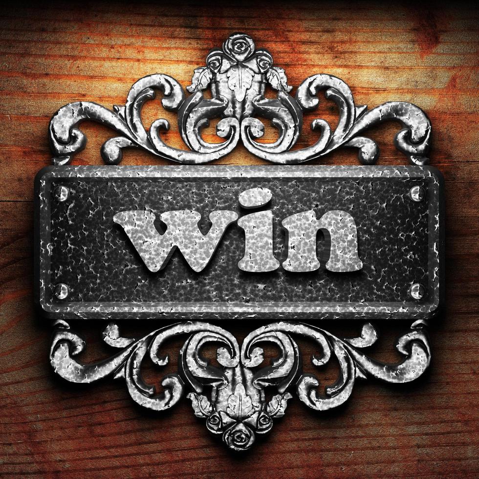 win word of iron on wooden background photo