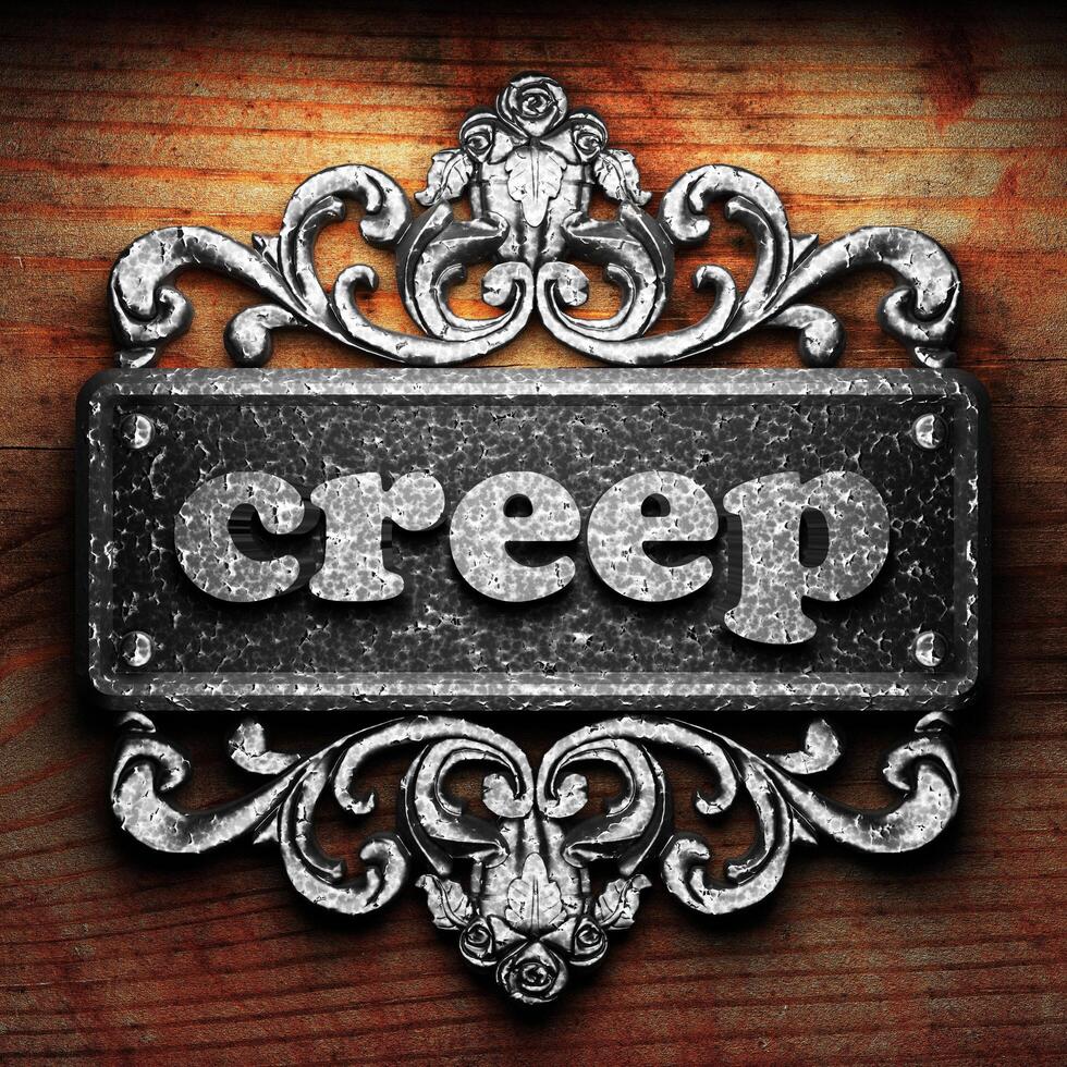 creep word of iron on wooden background 6340481 Stock Photo at Vecteezy