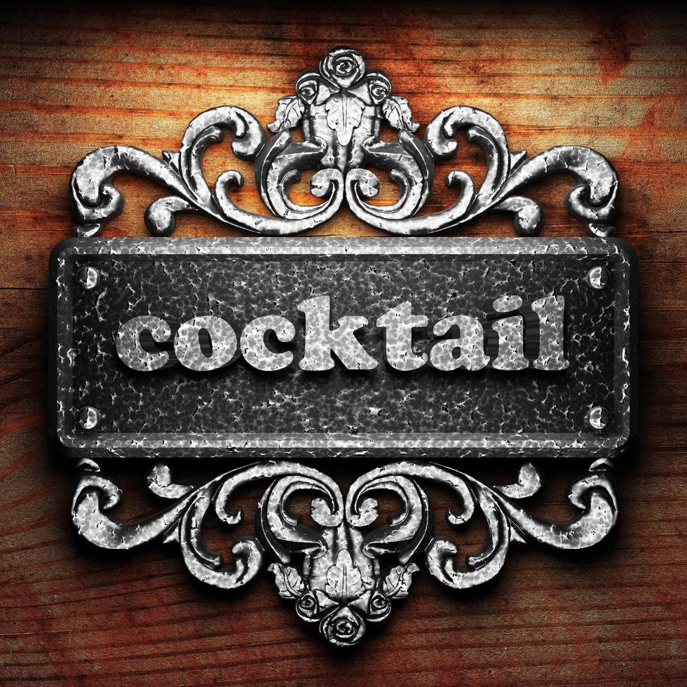cocktail word of iron on wooden background photo