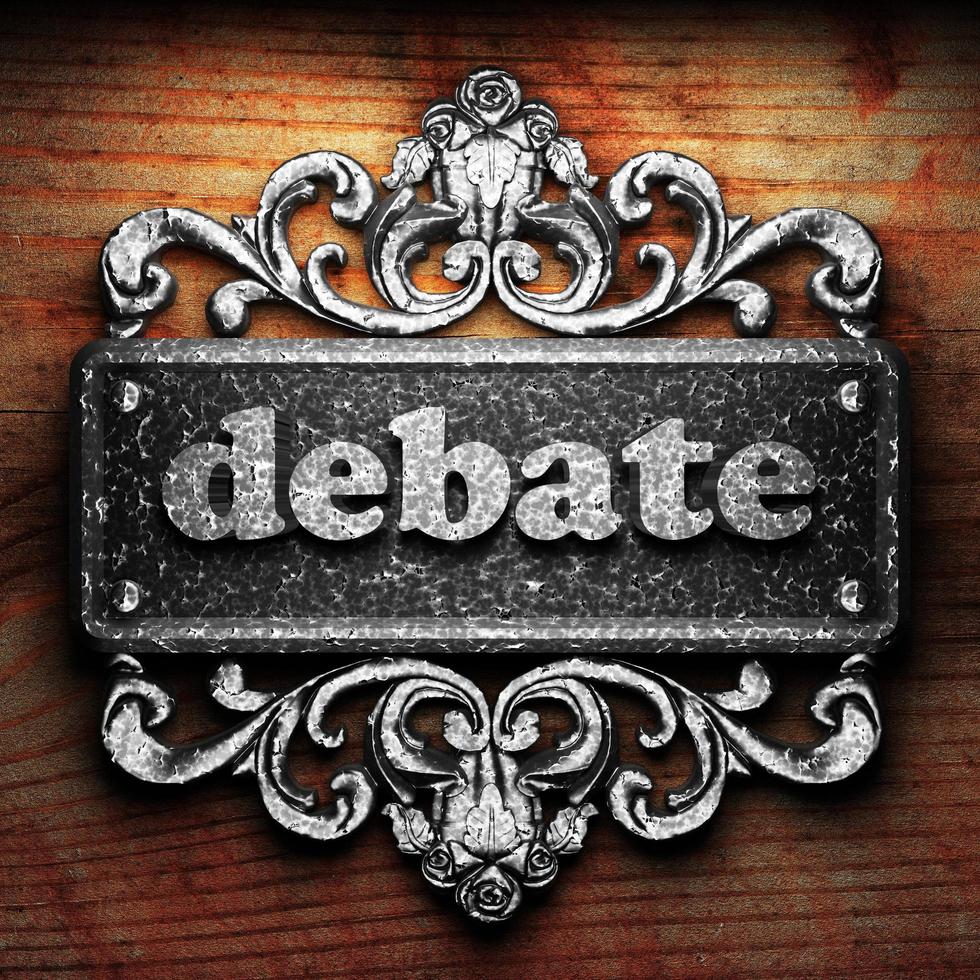 debate word of iron on wooden background photo