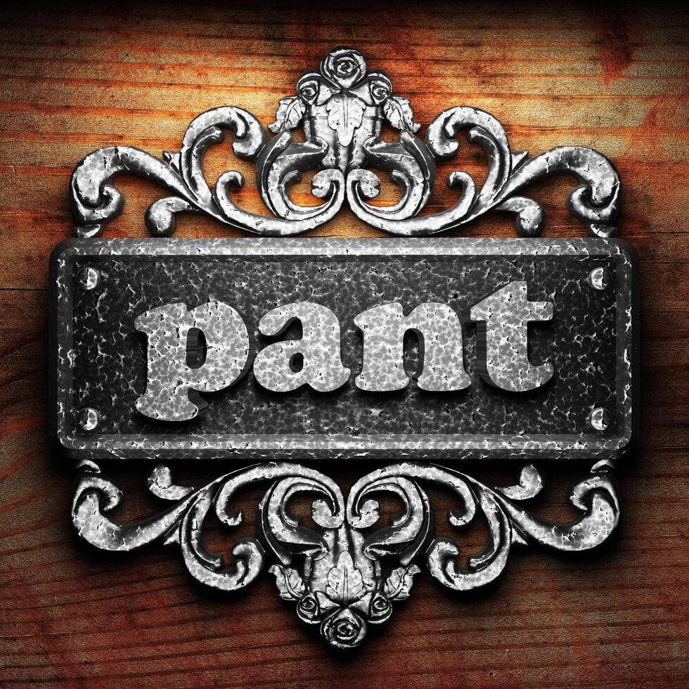 pant word of iron on wooden background 6342503 Stock Photo at Vecteezy
