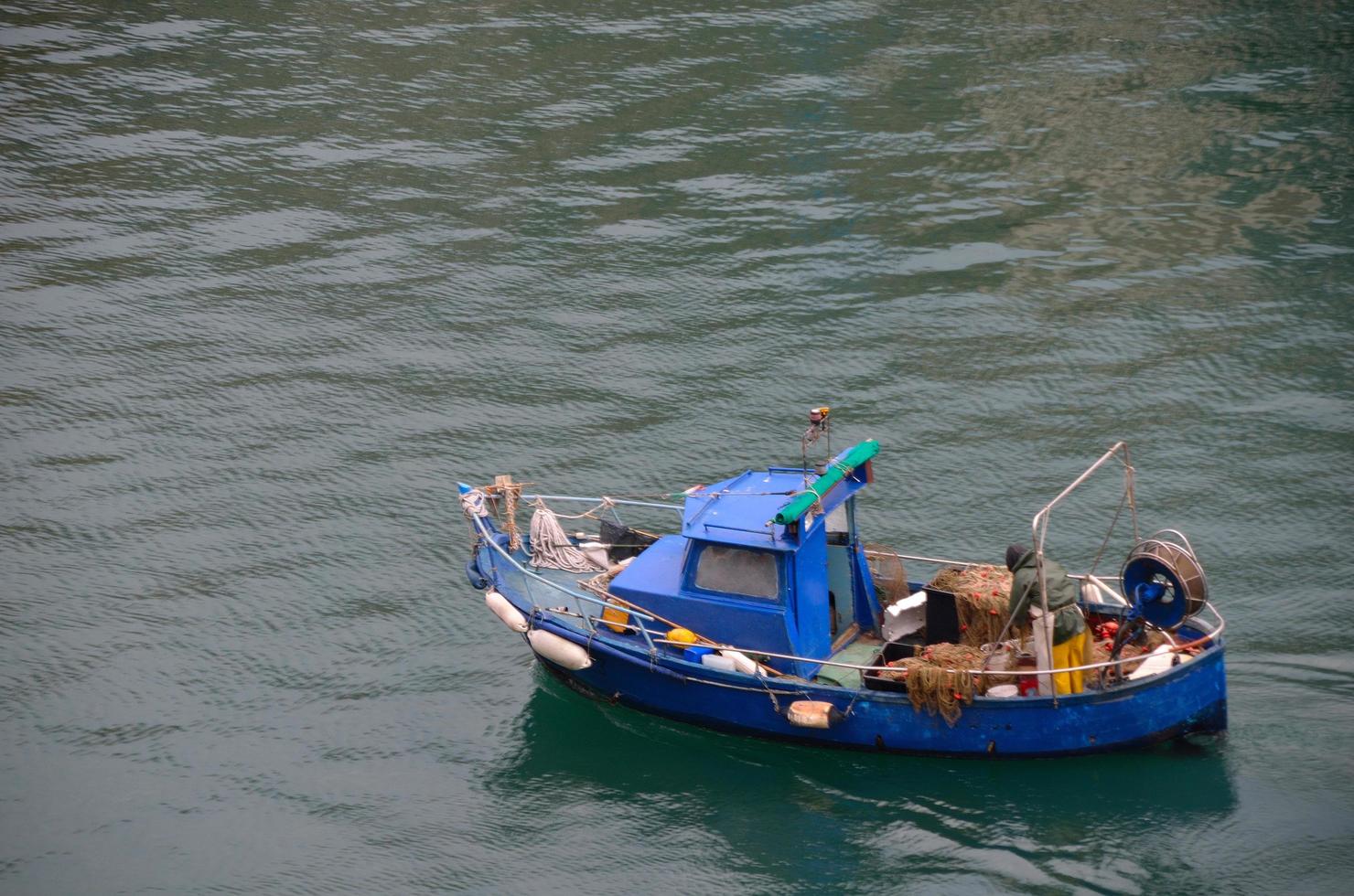 small blue boat photo