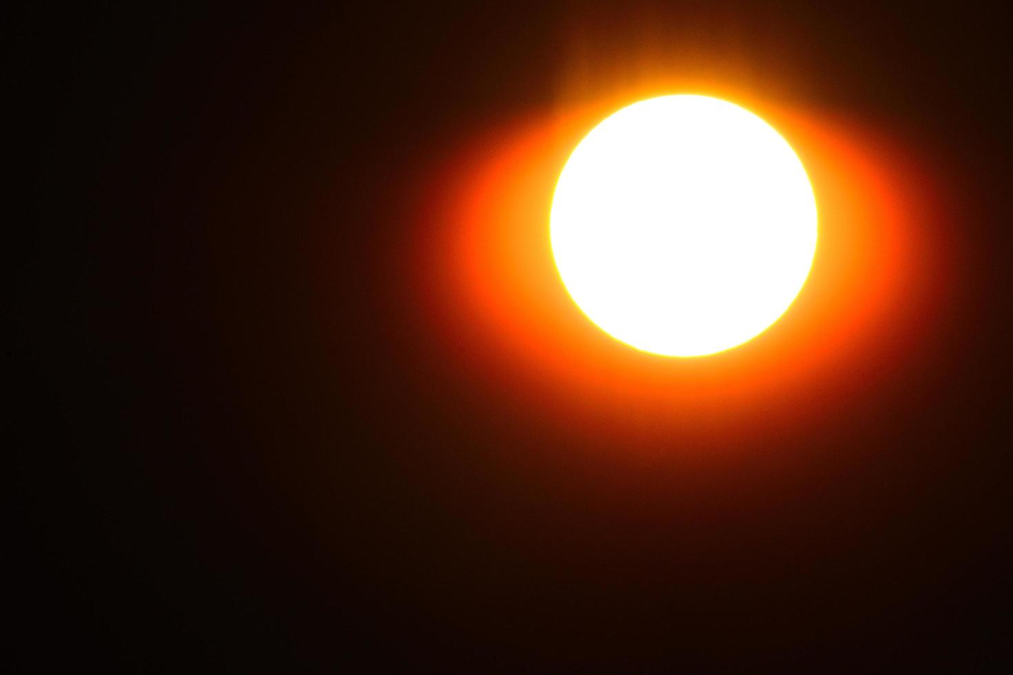 sun with radiation closeup photo