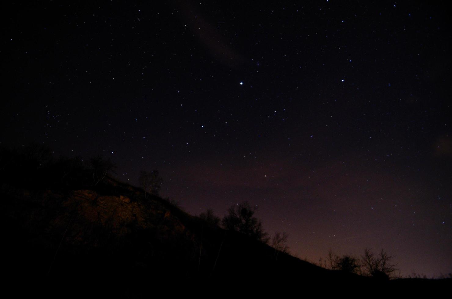 starry sky with mountain photo