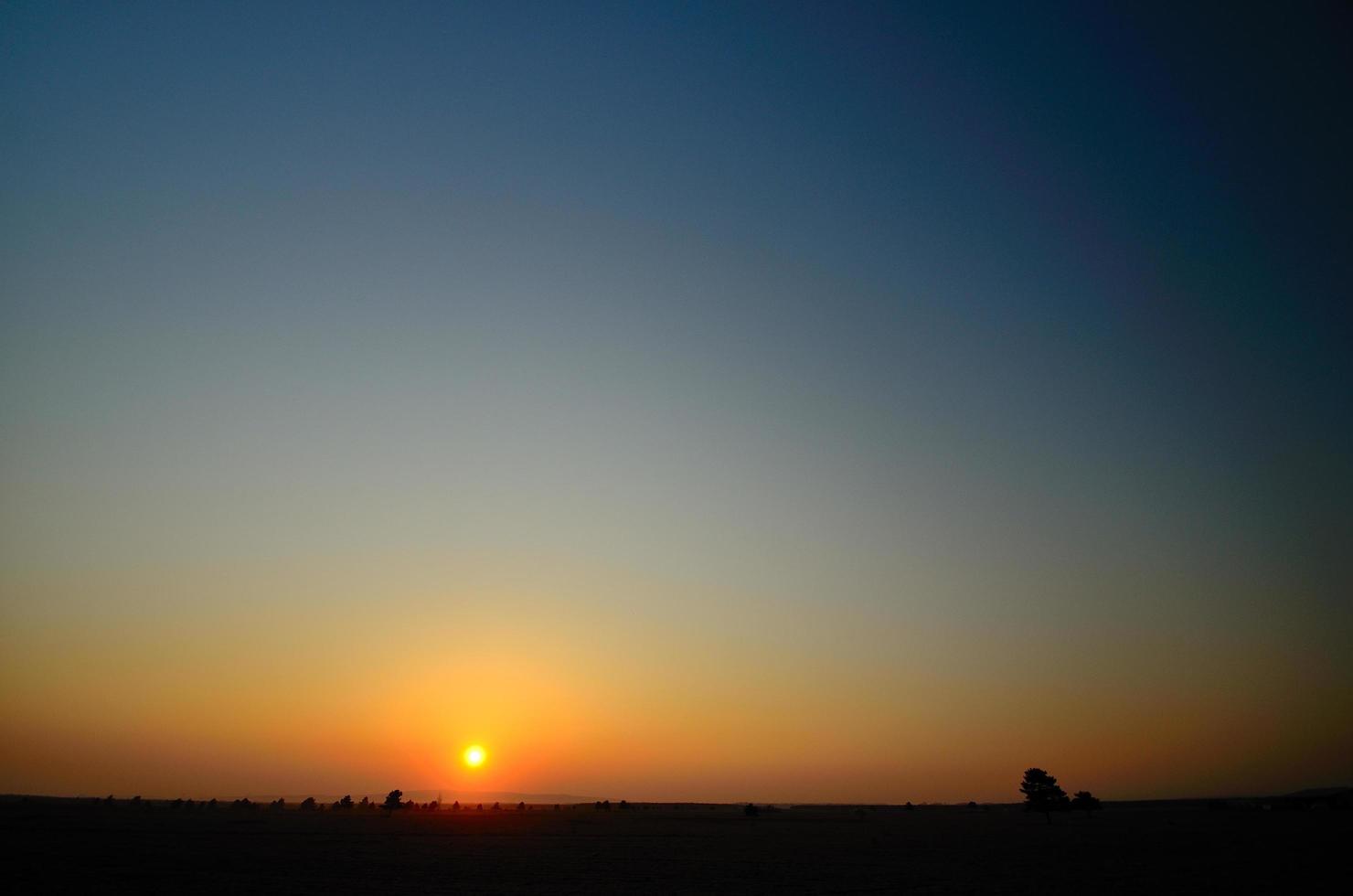 sunrise and flat landscape photo