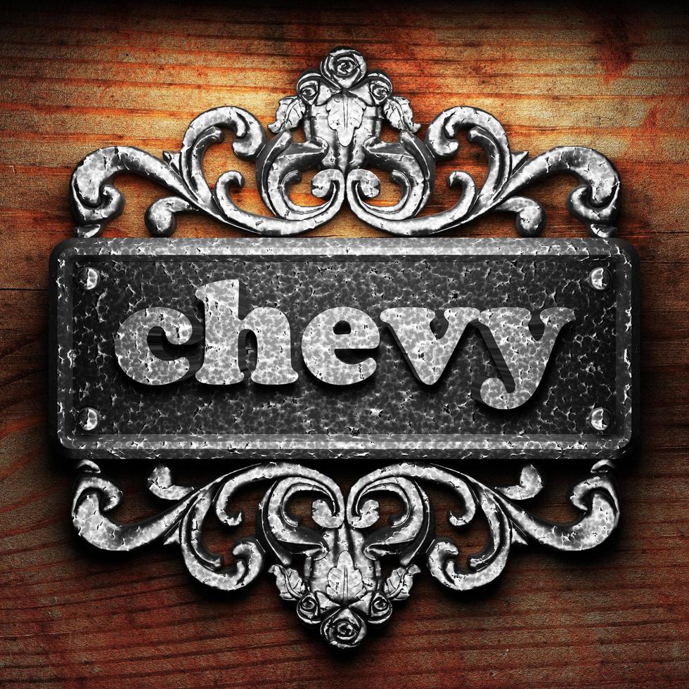 chevy word of iron on wooden background photo