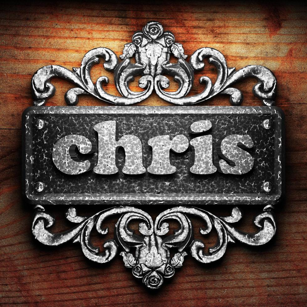 chris word of iron on wooden background photo