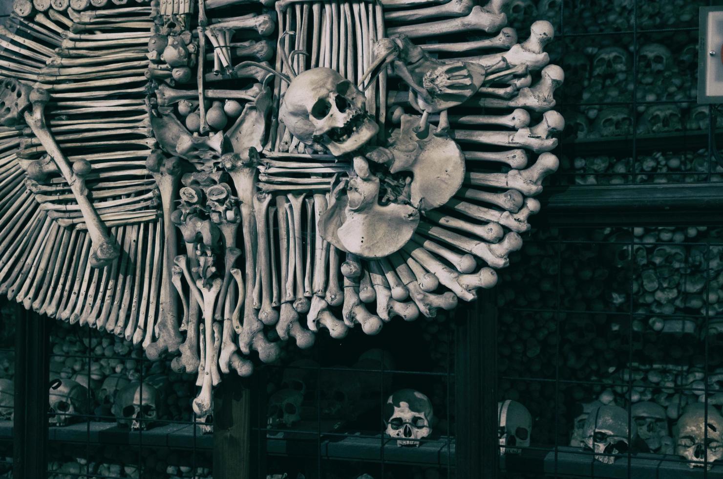 Kutna Hora, Czech Republic, May 14, 2019 Kutna Hora Church with colonnade of human bones and skulls photo