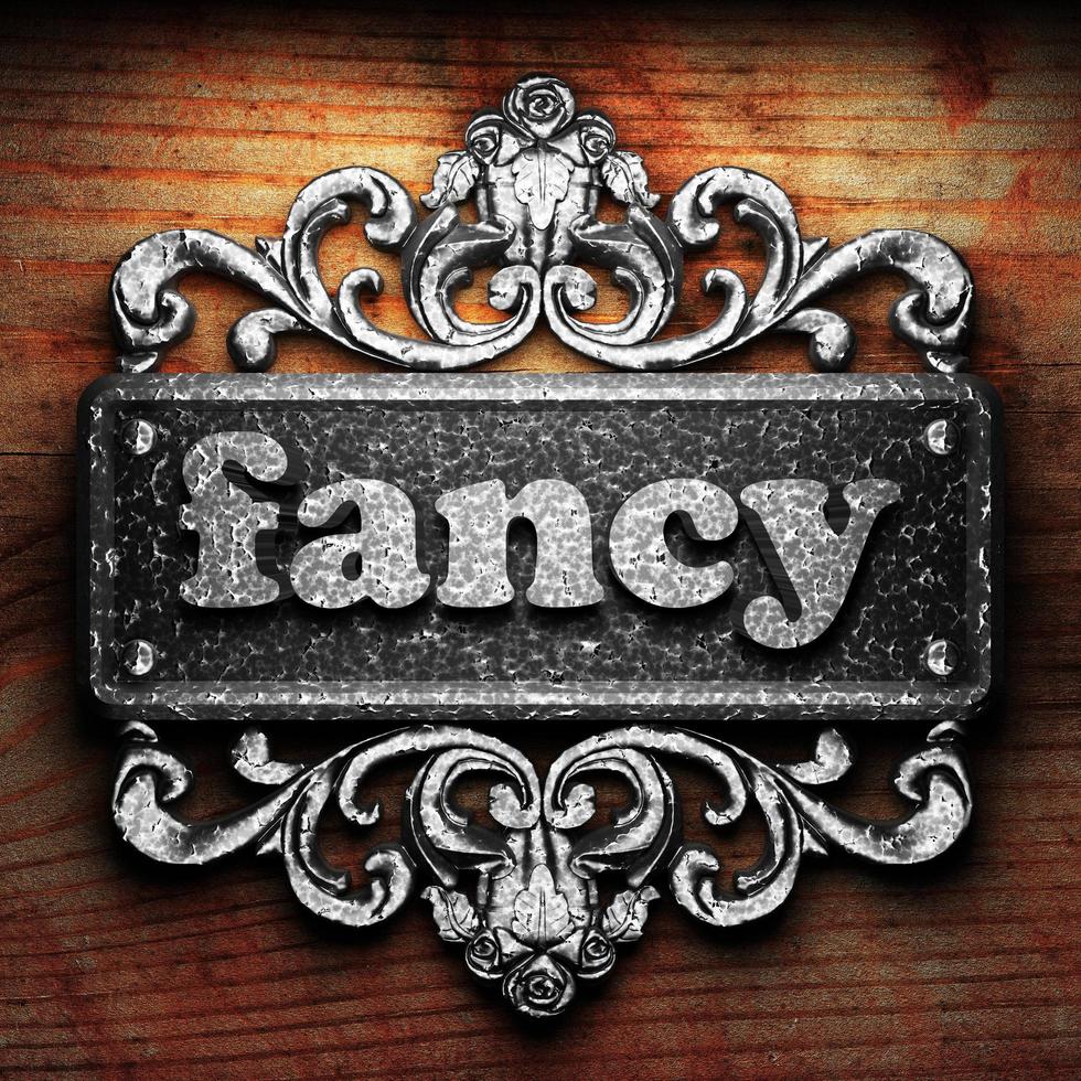 fancy word of iron on wooden background photo