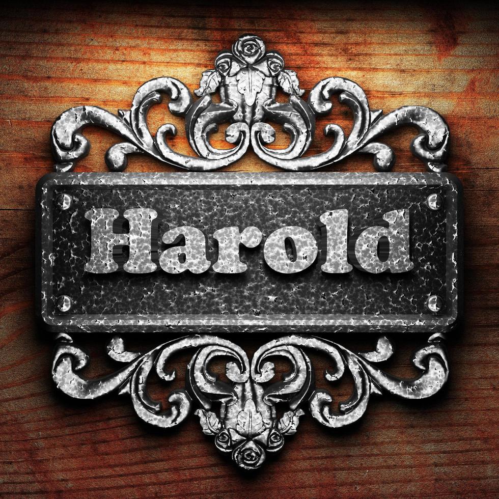 Harold word of iron on wooden background photo