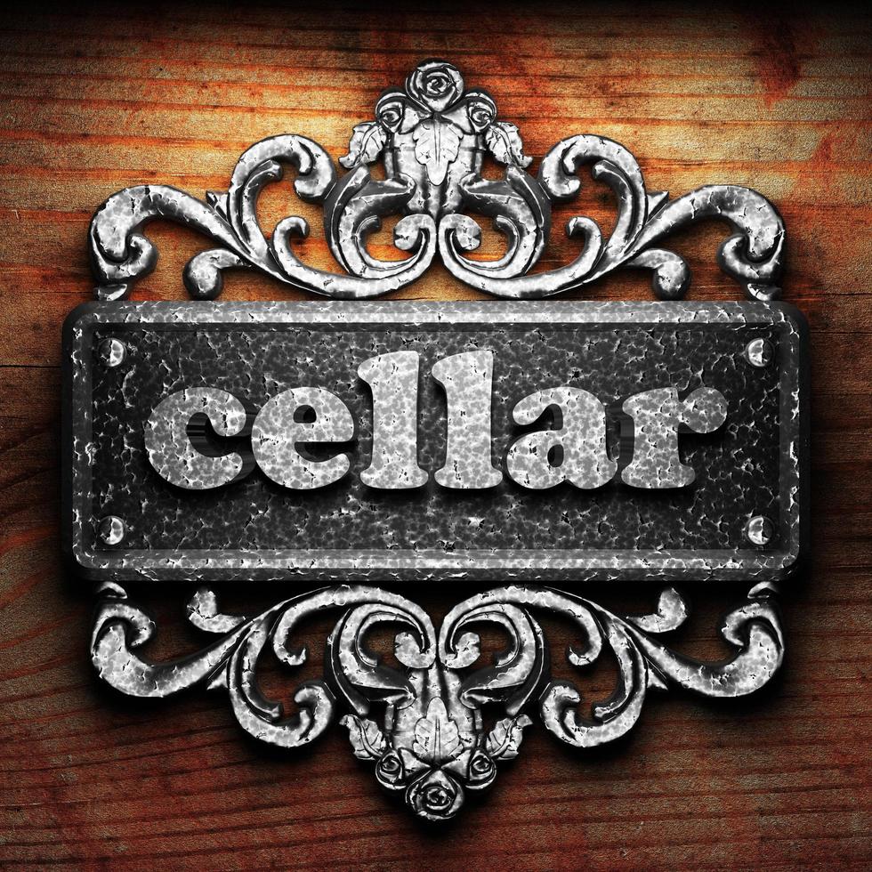 cellar word of iron on wooden background photo