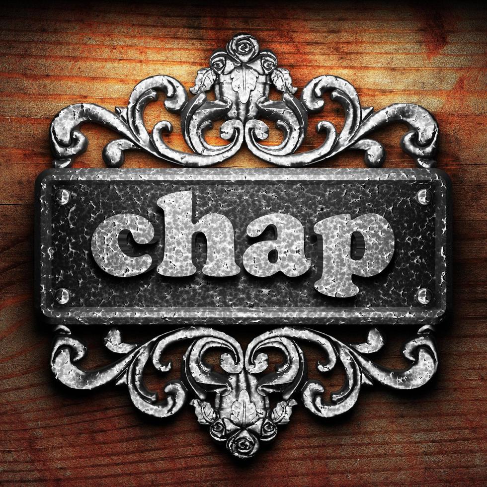 chap word of iron on wooden background photo