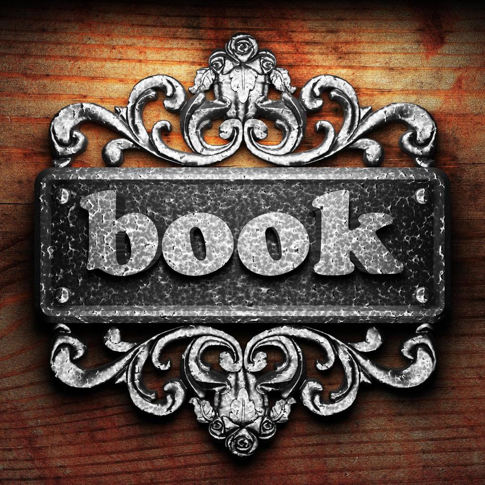 book word of iron on wooden background photo