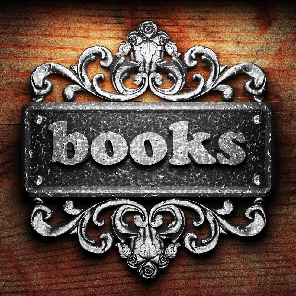 books word of iron on wooden background photo