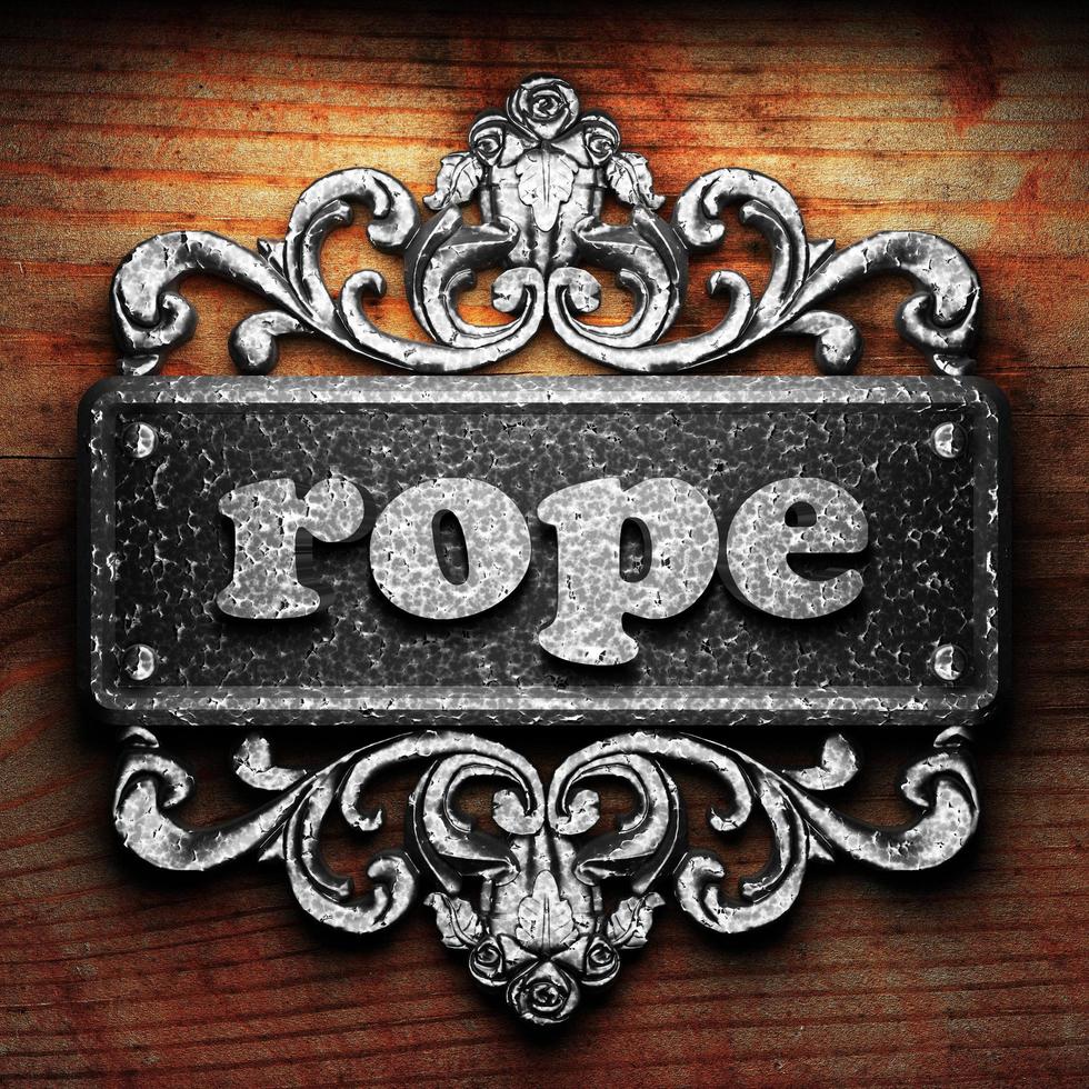 rope word of iron on wooden background photo