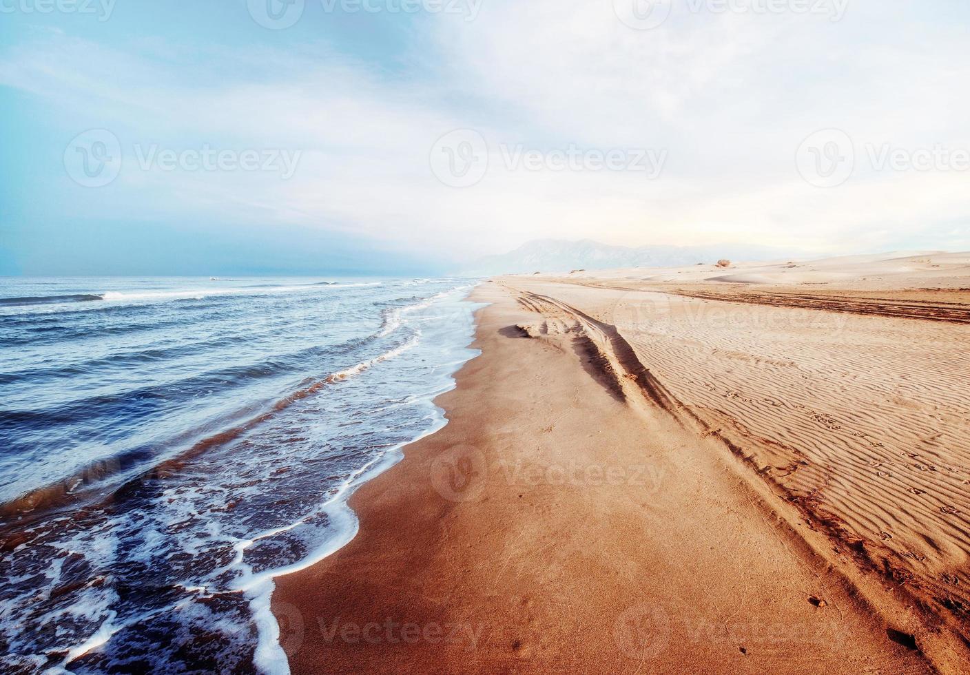 Fantastic sunset on the beach. beautiful landscape photo