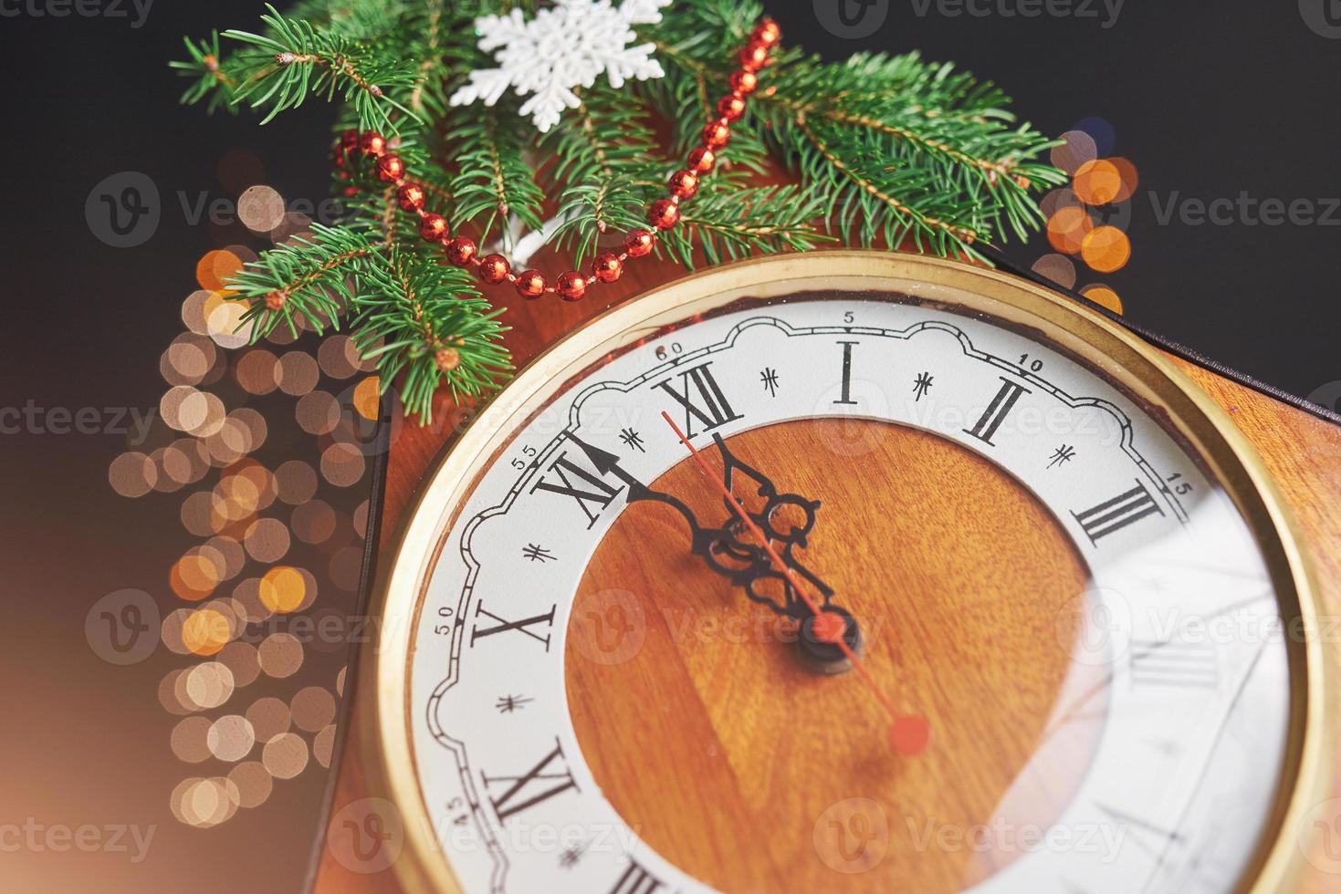 New Year's Clock. Old watches and Christmas decorations. Concept of New Year and Christmas. photo