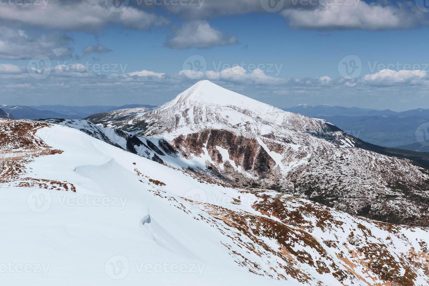 Mysterious winter landscape majestic mountains in winter. Winter road in the mountains. In anticipation of the holiday. Dramatic wintry scene. Carpathian photo