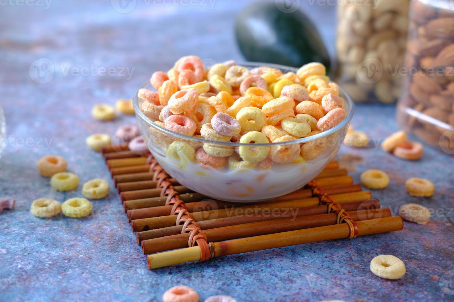 close up of colorful cereal corn flakes in a bowl photo