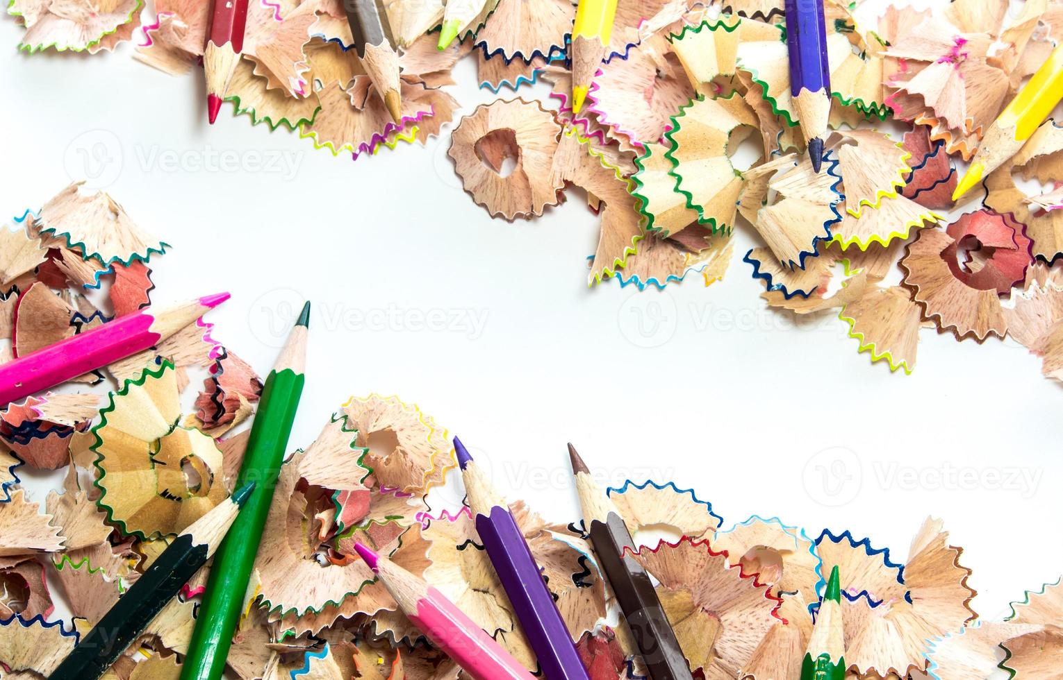 Space between colorful crayon pencil wood shavings photo