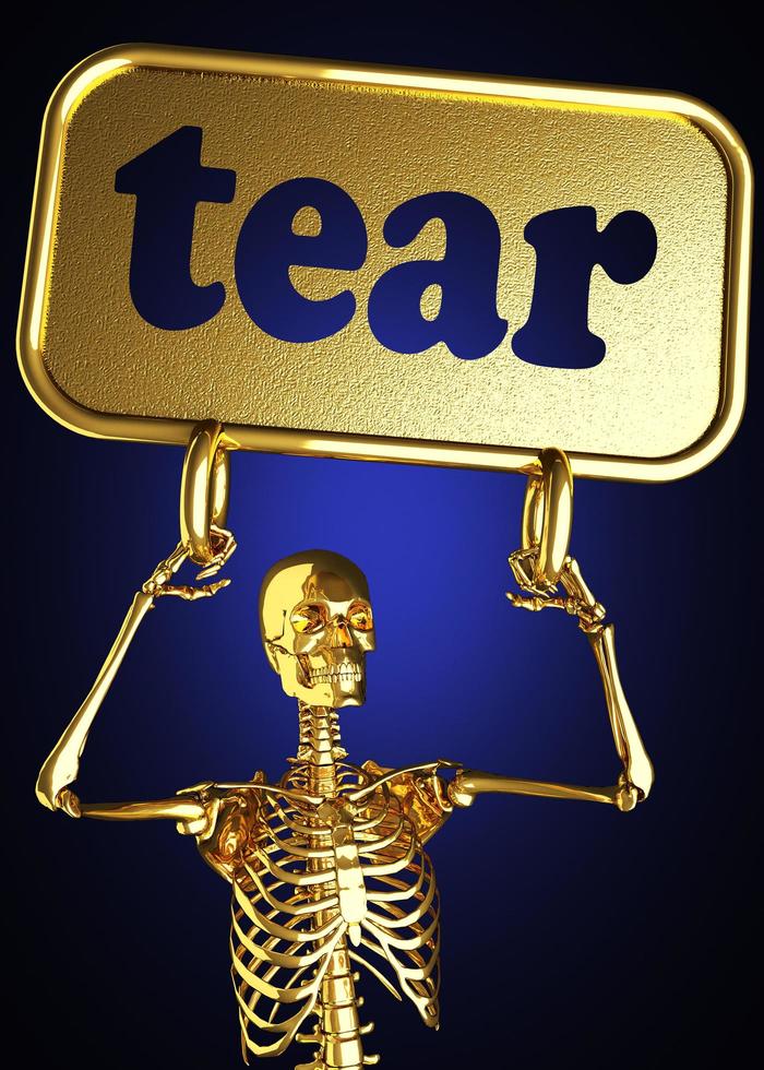 tear word and golden skeleton photo