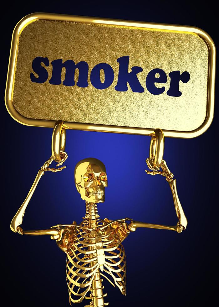 palabra fumadora y esqueleto dorado foto