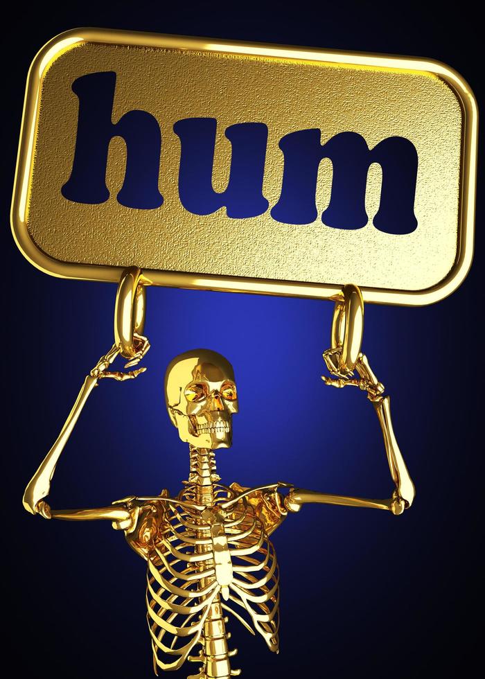 hum word and golden skeleton photo