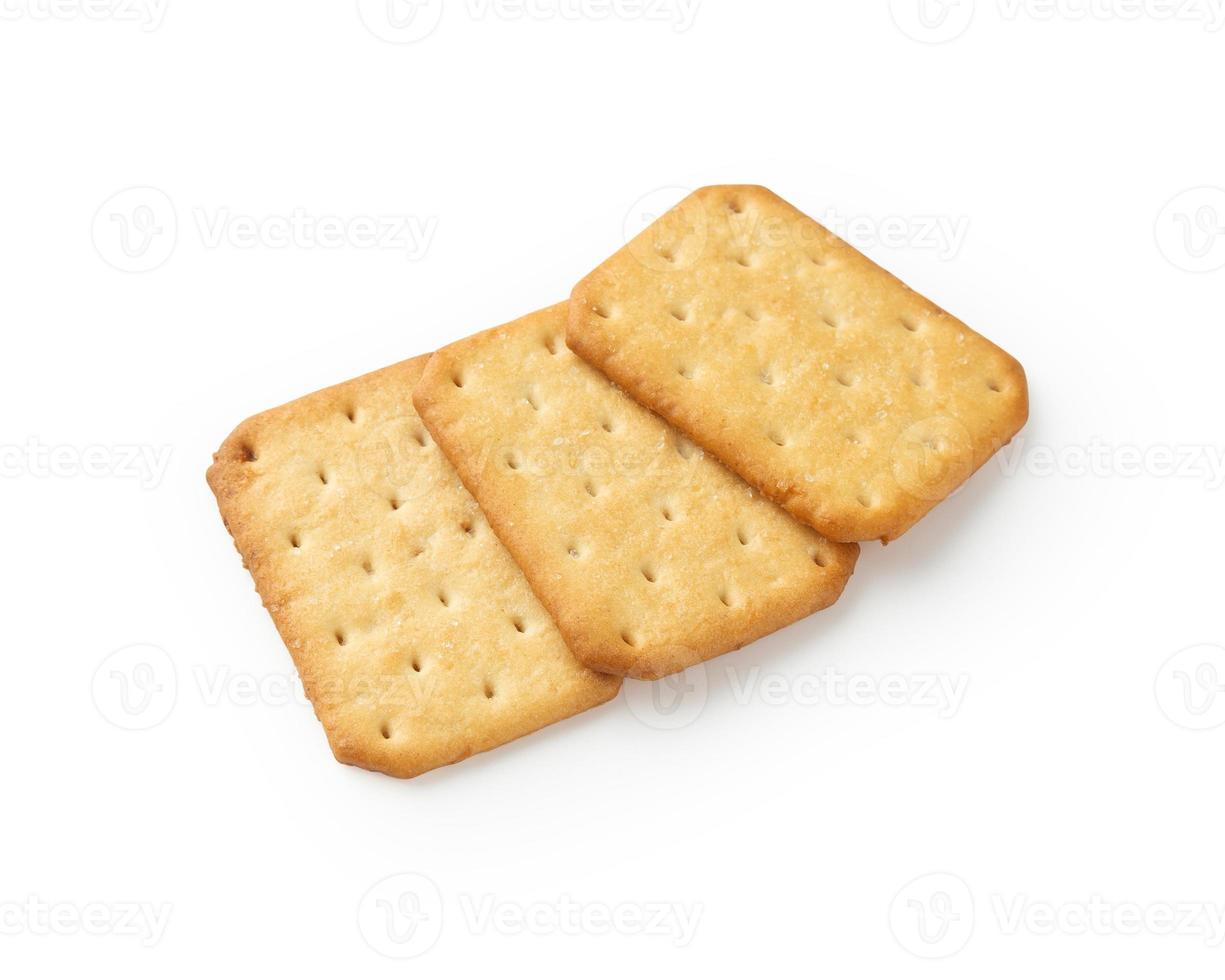 Galletas cracker aislado sobre fondo blanco con trazado de recorte foto